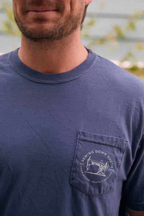 Baby's first pocket tee! How have we gone this long without a pocket tee? Our traditional logo on the front and our varsity logo on the back. Feels cozy: a heavyweight, 100% ring spun cotton tee (from Comfort Colors) Looks washed and retro Wears like your favorite college tee, unisex and relaxed fit Lookin' good: topstitched collar + double-needle at armhole, sleeve and bottom hems Craig wears a Large Retro Camp Shirt With Pockets, Vintage Camp Shirt With Pockets And Relaxed Fit, Comfort Colors Pocket Tee, Cotton T-shirt With Pockets For Outdoor, College Tees, Carhartt Pocket Tee, Round Logo, Down South, Comfort Colors Tee