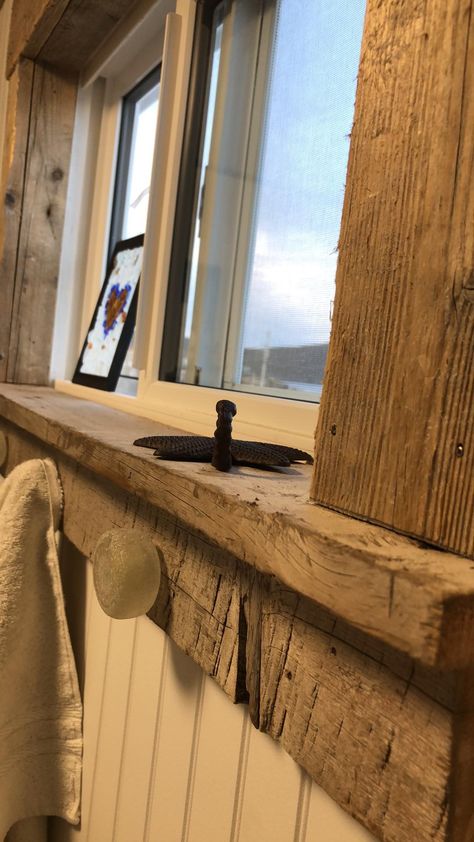 Drift wood window trim! Wood Window Sills Interior, White Windows With Wood Trim, Wood Framed Windows, Wood Window Trim, Wooden Window Sill, Wood Window Sill, Window Sill Trim, Country Homestead, Cabin Windows