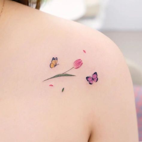 20+ Cute Small Butterfly Tattoo Designs and Ideas - HowLifeStyles Butterfly Flower Wrist Tattoo, Small Butterfly Tattoo With Color, Tulip And Butterfly Tattoo, Small Butterfly Tattoos For Women, Butterfly And Flower Tattoo Designs, Mini Butterfly Tattoo, Small Butterfly Tattoo Designs, Flower And Butterfly Tattoo, Butterfly And Flower Tattoo