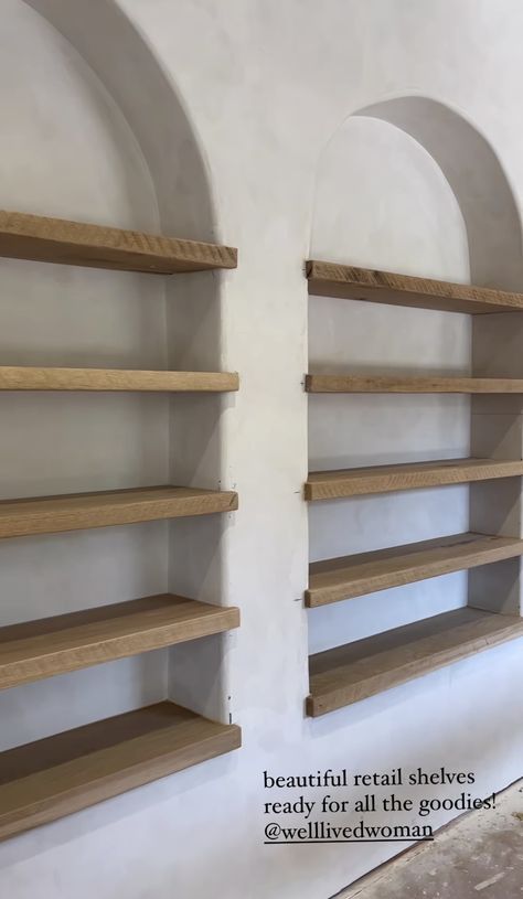 Adobe Built In Shelves, Floating Retail Shelves, Arched Floating Shelves, Stucco Built In Shelves, Shelves Between Columns, Arch Bookcase Diy, Drywall Niche, Small Salon Decor, Stone Shelves