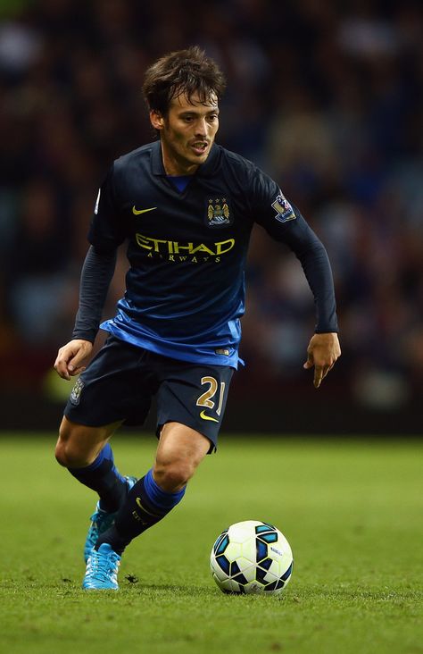 David Silva of Manchester City in action during the Barclays Premier League match between Aston Villa and Manchester City at Villa Park on October 4, 2014 in Birmingham, England. David Silva, Barclays Premier League, Villa Park, James Rodriguez, Birmingham England, Premier League Matches, Pep Guardiola, Football Boys, October 4