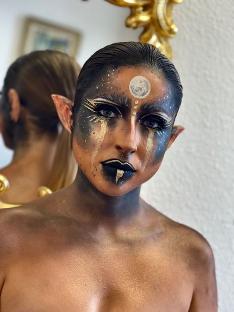 Black Woman Gold Makeup, Gold Alien Makeup, Black And Gold Eye Makeup Tutorial, Hades Inspired Makeup, Moon Elf Makeup, Nyx Goddess Makeup, Gold Fairy Makeup, Lunar Makeup, Steampunk Makeup Halloween