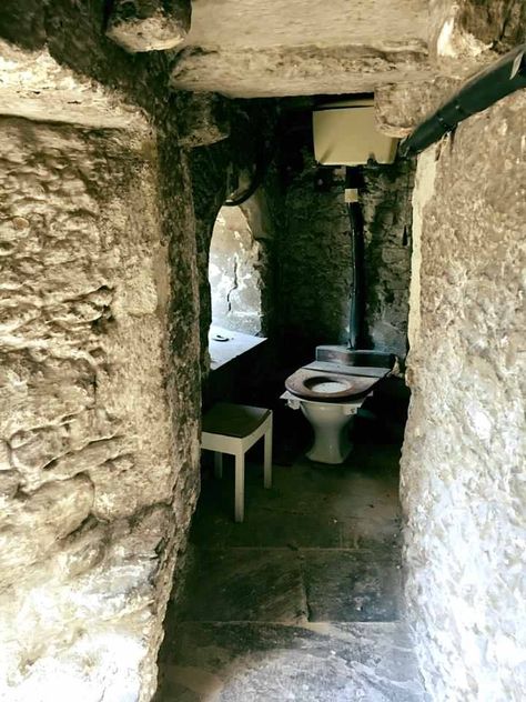 A spooky toilet in the Tower of London. Historic stone walls, floor, and antique toilet bowl Antique Toilet, Plumbing Humor, Rustic Toilet, Victorian Toilet, Rustic Toilets, Out House, The Tower Of London, Castles Interior, Scotland Castles