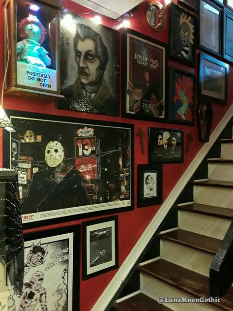 Our home is filled with horror themed room decor & collectables. Our home is 1500 square feet, so we use every inch to our advantage. We have filled the staircase wall with Horror Art from local Florida artists as well as art we have created ourselves. Horror Movie Collection Room, Halloween Themed Room Decor, Movie Theme Room Decor, Horror Home Aesthetic, Scary Movie Room Ideas, Horror Movie Theater Room, Horror Office Decor, Horror Themed Apartment, Horror Movie House Decor