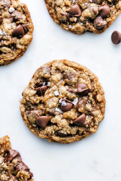 Soft, chewy, buttery, and best of all CHOCOLATEY: these oatmeal chocolate chip cookies are the absolute best! Plus tips to make these perfect everytime! Oat Chocolate Chip Cookies Healthy, Cookies Oatmeal Chocolate Chip, Oatmeal Chocolate Cookies Recipes, Soft And Chewy Oatmeal Chocolate Chip Cookies, Chocolate Chip Oatmeal Raisin Cookies, Soft Chewy Oatmeal Chocolate Chip Cookie, Choc Oatmeal Cookies, Chocolate Chip And Oatmeal Cookies, Oatmeal Chocolate Chip Cookies Chewy