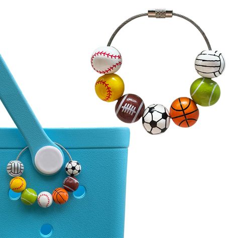 PRICES MAY VARY. 【ADORABLE SPORTS CHARM FOR BOGG BAG】: Add a touch of sporty style charm to your bogg bag ! Our cute sports ball charm for bogg bag consists of 7 different beautifully crafted wooden beads , with classic white baseball ,Yellow BaseBall , BasketBall, Football, Rugby, Tennis, VolleyBall patterns designs, strung together on a sturdy stainless steel cable. These sport charm accessories add a playful and sporty touch to your beach totes bag, making it stand out from the crowd. 【SHOW Y Charm Accessories, Beach Totes, Beads Accessories, Bogg Bag, Totes Bag, Bag Decoration, Favorite Handbags, Bag Charms, Bag Cute