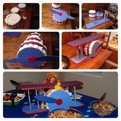 Baby boy shower-diaper plane! Start by making a regular diaper cake, turn it on its side. Finish the bottom of the cake and add a propeller. Make the wings separately out of cardboard, wrap with craft paper or fabric. Fit the diaper plane through narrow side first and decorate! Diy Diaper Cake, Airplane Baby Shower, Diaper Gifts, Baby Bash, Airplane Baby, Nappy Cakes, Baby Shower Diaper Cake, Baby Diaper Cake