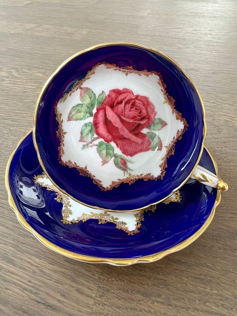 Step into elegance with this exquisite vintage Paragon tea cup and saucer set! Delicately crafted with timeless floral patterns, it’s perfect for savoring your favorite blends in style. 🌸✨ Tap to shop this charming piece for your tea collection! #VintageTeaCup #TeaTimeDelight #EtsyFinds #VintageHomeDecor #ParagonChina Royal Halsey Lm Violet With Red And Pink Roses Tea Cup, Paragon China, English Teacups Vintage, Chinese Teacup, Blue Tea Cups Vintage Teacups, Paragon Tea Cup, Cabbage Roses, Red Cabbage, Tea Collection