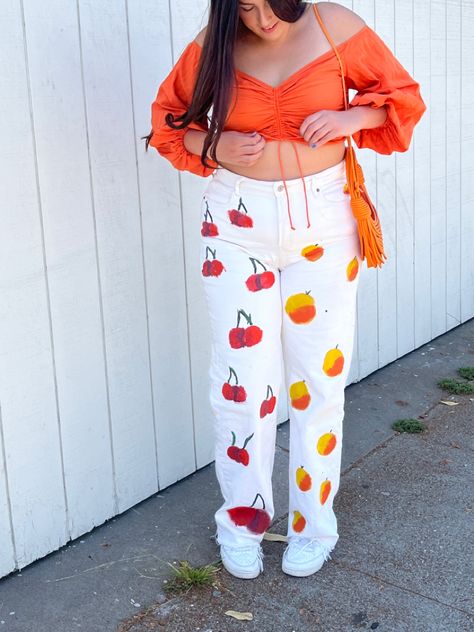 Diy painted pants, painted fashion, painted jeans inspo, painted jeans plus size edition, fruit pants, lemon pants, orange pants, cherry pants, fun fashion Diy Painted Pants, Cherry Pants, Painted Pants, Lemon Pants, Fashion Inspo Casual, Painted Fashion, Statement Fashion Pieces, Vibrant Outfits, Orange Pants