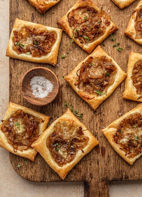 These Caramelized Onion Puff Pastry Tarts are made with flaky pastry, topped with caramelized onion and brie cheese.Your new go-to appetizer for the upcoming holiday season! Caramelized Onion Tart Puff Pastries, Onion Balsamic Puff Pastry, Carmelized Onion Puff Pastry Tart, Caramelized Onion Brie Puff Pastry, Upside Down Caramelized Onion Tart, Onion Pastry Tart, French Onion Tart Puff Pastry, Upside Down Onion Puff Pastry, Onion Tart Puff Pastry