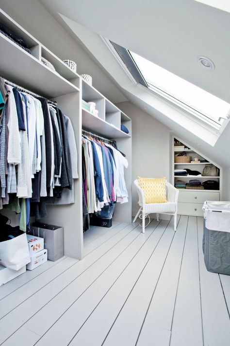 This bespoke dressing room (the stuff of dreams, right?) makes clever use of the space in the eaves with built in storage that combats the limitations of an awkward sloping roof. #loftconversion #loft #dressingroom #slopingroof #storage #realhomes Attic Snug, Loft Conversion Dressing Room, Loft Wardrobe, Loft Conversion Ideas, Loft Conversion Design, Wardrobe Dressing, Loft Conversion Bedroom, Dormer Loft Conversion, Loft Extension