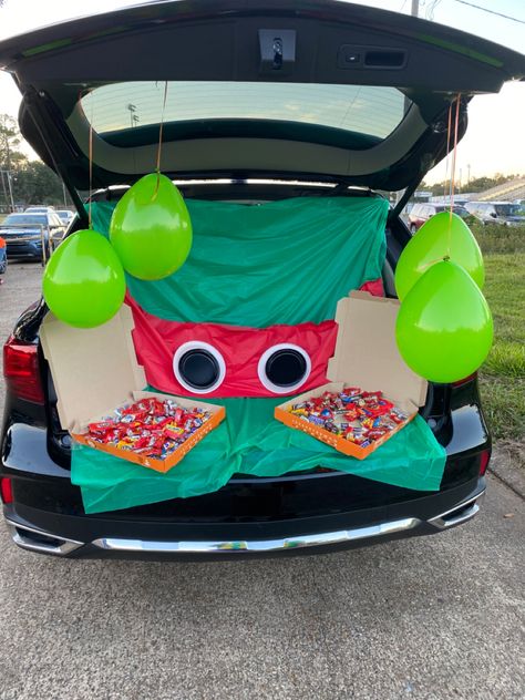 Cool Trunk Or Treat Ideas For Cars, Trunk Or Treat Ideas For Daycare, Ninja Trunk Or Treat Ideas, Hulk Trunk Or Treat, Care Bear Trunk Or Treat Ideas For Cars, Football Trunk Or Treat Ideas For Cars, Turtle Trunk Or Treat, Diy Trunk Or Treat Ideas For Cars Easy, Hawaiian Trunk Or Treat