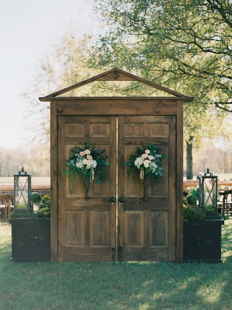 When it comes to wedding ideas and design in general, the things that always really get me are just… whimsical. The post office that sends out teeny tiny letters. Donut walls. Dogs in floral … Outdoor Wedding Entrance, Wedding Doors, Wedding Entrance Decor, Rustic Outdoor Wedding, Wedding Ceremony Backdrop, Wedding Entrance, Rustic Outdoor, Outside Wedding, Old Doors