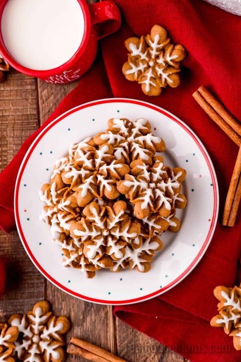 Gingerbread Spritz Cookies are nostalgic holiday treats filled with warmth and joy that everyone loves to make as much as they love to eat! #RealHousemoms #gingerbread #spritz #cookies #spritzcookies #cookiepress #molasses #whitechocolate #christmascookies #cookieexchange #cookieswap Spiced Jam Spritz Cookies, Ginger Spritz Cookies, Peppermint Spritz Cookies, Spritz Cookies With Jam, Gingerbread Spritz Cookie Recipe, Best Spritz Cookie Recipe Christmas, German Spritz Cookies, Decorating Spritz Cookies, Italian Spritz Cookies