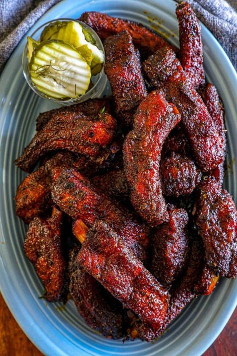 These Cajun ribs feature tender baby back ribs coated in a bold blackened Cajun seasoning, delivering a smoky, spicy kick. Finished with a rich honey butter glaze, they balance the heat with a touch of sweetness for an irresistible flavor. Cajun Ribs, Spicy Ribs, Honey Butter Glaze, Glazed Ribs, Bbq Dry Rub, Butter Glaze, Back Ribs, Ribs Recipe, Baby Back Ribs