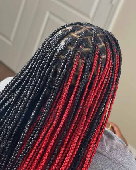 If you’re looking for a new style, you should definitely consider red box braids. This bold and vibrant hair color is perfect for making a statement and can be styled in many different ways. Whether you want to keep your red box braids simple or add some fun accessories, there’s sure to be a style that suits you. And to help you get inspired, we’ve rounded up the best red box braid styles to try. Braided Hairstyles Peekaboo Red, Hair Styles Braids With Color, Red Peak A Boo Hair Braids, Braids For Black Women Red And Black, Black Red Box Braids, Red And Black Braids Black Women, Peekaboo Box Braids Red And Black, Braids With Red In The Back, Red Skunk Stripe Knotless Braids