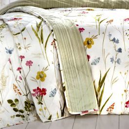 A hand painted delicate floral meadow with a fresh mix of bright spring colours, printed onto crisp easy care, polycotton white fabric. This vibrant bedding will bring colourful warmth to your bedroom and is fully reversible with contrasting vertical green stripe. Vibrant Bedding, Floral Meadow, Floral Bedspread, Spring Colours, Made To Measure Blinds, Vintage Floral Design, Bedroom Furnishings, Floral Duvet Cover, Polycotton Fabric