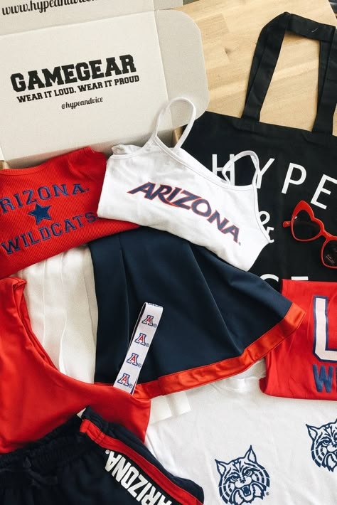 UofA University of Arizona College Apparel. cute, casual, stylish tops, tennis skirts, tubetops,loungewear sets and more ! #gamebae #changingthegame #UofZ #Universit of Arizona #collegeaparrel #beardown #arizonawildcats #UA #collegespirit #gamedayoutfits #gameday #collegespirit #tailgate College Shirt Outfit, U Of Arizona, Cheerleader Aesthetic, College Vibes, Thrift Ideas, College Necessities, U Of A, College Things, College Tailgating