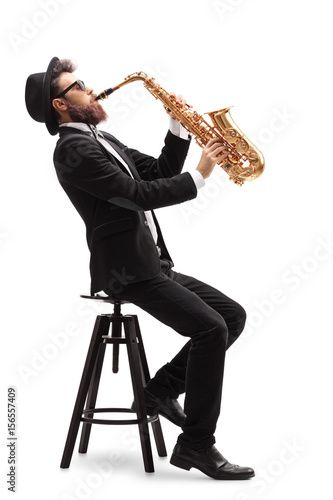 Saxophone Players, Man Sitting, Jazz Musicians, Figure Poses, A Chair, Music Poster, Pose Reference, Adobe Stock, Musician