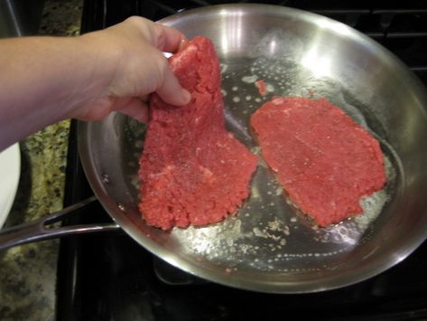 placing uncooked seasoned cube steaks into a stainless steel frying pan Pork Cube Steaks, Fried Cube Steaks, Beef Cube Steak Recipes, Steak On Stove, Beef Cutlets, How To Make Steak, Beef Cubed Steak, Cooking Fever, Cubed Steak