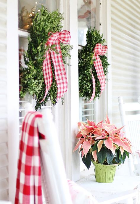 Tour of a Vintage Christmas Cottage - Thistlewood Farm Cottage Outdoor Christmas Decor, Red And White Christmas Porch Ideas, Red Gingham Christmas Decor, Red And White Christmas Wreaths, Christmas Cottage Exterior, Country Christmas Porch, Farmhouse Christmas Front Porch, Christmas Cottage Decor, Red Gingham Christmas