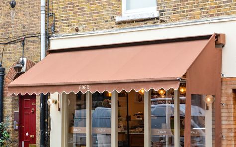 As a Traditional Blinds and Awnings maker we are called upon to use skills which have been honed over 130 years in the industry. A recent project involved the design, manufacture, and installation of a bespoke, tailored, side curtain to be installed to the Traditional Victorian Awning at “Fred” café on Northington Street in London. #sidecurtain #shop #commercial #curtain #exteriordesign #weather #protection #traditional #blinds #bespoke #awning #café #Northington #London #modern #technology French Awning, Victorian Awning, Cafe Awning, Residential Awnings, Shop Awning, Garden Awning, Hamilton Island, Window Awnings, Store Window