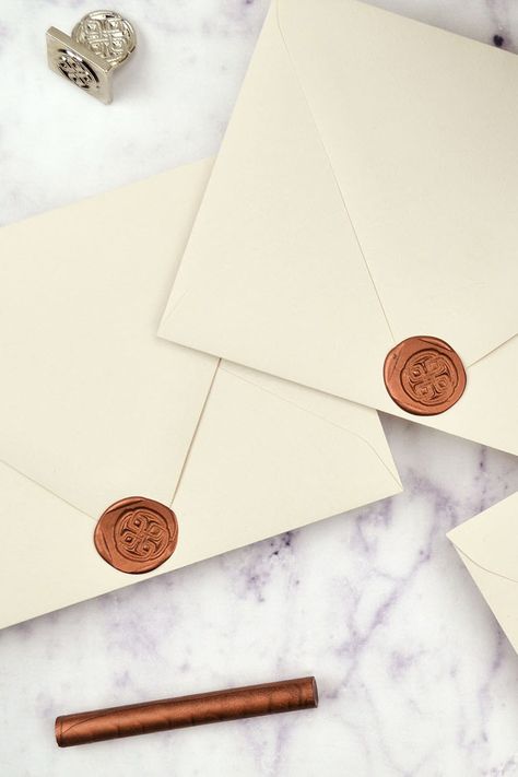 Easy DIY wax seals for elegant wedding invitation envelopes using our low temperature hot glue gun, sealing wax, and wax seal stamp. Shown here are our Copper wax seals, Mist envelopes and Celtic Knot sealing stamp. #wax #envelopes #weddinginvitations #sealingwax #waxseals #waxsealstamp #waxsealedenvelope #envelopeart #weddingplanning #stationery #weddingideas #weddinginspiration #weddinginvite #elegantweddinginvites #celticknot #copper #mist #neutraltones Wax Seal Wedding Invitations, Wedding Invitations Printable, Wax Seal Wedding, Wedding Invitations Envelopes, Diy Wedding Invitations, Diy Wax, Pockets Design, Envelope Art, Wedding Invitation Envelopes