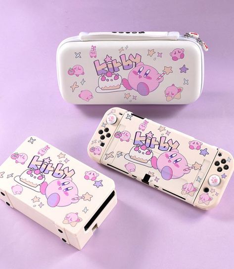 Discover magic and sweetness with our Birthday Kirby Star Nintendo Switch Case. Featuring an adorable Kirby pattern, a birthday cake, and a magical Kirby design, this dreamy pink and lavender protective shell is just the start. The set also includes a matching portable bag and dock case, all sporting the same unique design. This one-of-a-kind set is perfect for protecting your Nintendo Switch in style. Kirby Nintendo Switch, Kirby Nintendo Switch Case, Nintendo Case, Nintendo Switch Decoration, Kawaii Nintendo Switch, Kirby Nintendo, Nintendo Switch Case, Nintendo Switch Accessories, Video Game Room Design