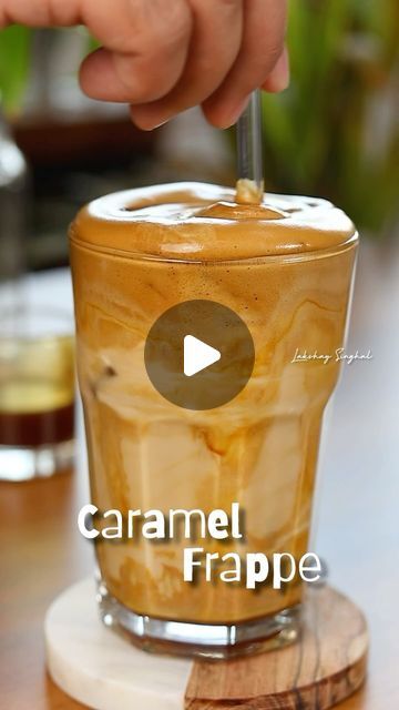 Lakshay Singhal on Instagram: "Caramel Frappe 🌟
Experience the perfect balance of rich caramel and smooth frappe, creating a refreshing and indulgent drink that's simply irresistible. ✨

Although a frappe is a blend of ice, coffee, and milk, but this recipe offers a quick and easy way to make it. 😊

Ingredients
1. 1 tbsp Instant Coffee
2. 1 tbsp Caramel Sauce
3. 3-4 tbsp Water
4. Ice Cubes
5. 1 cup Milk

Instructions:
1. In a glass, add 1 tbsp instant coffee of your choice with 1 tbsp of caramel sauce.
2. Now blend it with 3-4 tbsp water.
3. Transfer it to a separate glass and add ice cubes and 1 cup Milk.

#caramelcoffee #caramelfrappe #caramelfrappuccino #frappe #frappuccino #coldcoffee #icedcoffee #coffee #lakshaysinghal #reelkarofeelkaro 

[caramel frappe, caramel frappuccino, coffee Caramel Frappe Recipe, Caramel Frappe, Coffee And Milk, Frappe Recipe, Caramel Frappuccino, Caramel Coffee, Simply Irresistible, Ice Coffee, Coffee Dessert