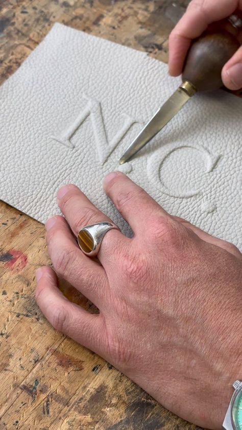 Going at it on a personalised debossed Cheyne clutch. - - - #madetoorder #accessories #madeinlondon #handcrafted #luxuryleathergoods | Instagram Small Leather Gifts Diy, How To Emboss Leather, Leather Products Ideas, Leather Projects Ideas, Leather Techniques, Custom Leather Bag, Leather Embossing, Leather Tutorial, Men Clutch Bag