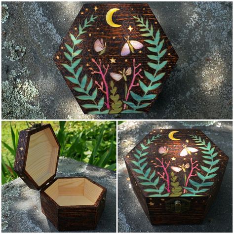 Hexagonal Wood Burn Moth & Floral Box The majority of this box has been wood burnt, resulting in a unique texture to the wood. Floral designs were hand painted with acrylics Dimensions are: 5" Width 4.25" Length 3" Height Painted Wooden Boxes Witchy, Woodburning Box Ideas, Design For Box Ideas, Hand Painted Wooden Box Design, Wooden Chest Paint Ideas, Wood Box Painting Ideas Easy, Hand Painted Boxes Wood, Aesthetic Box Design, Painted Wood Box Ideas