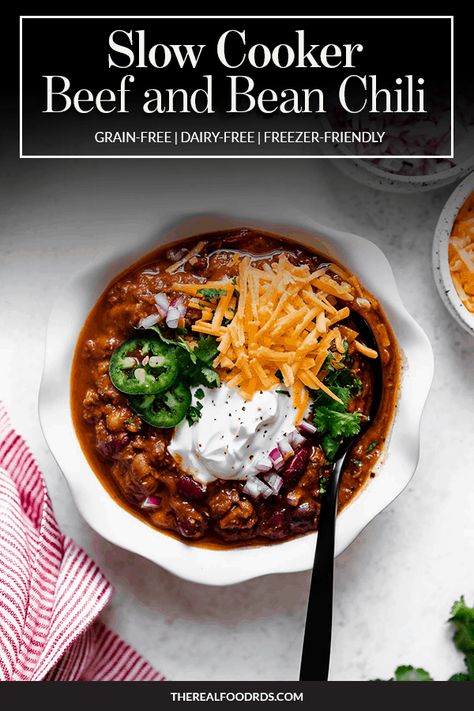 Slow Cooker Beef and Bean Chili | This Slow Cooker Beef and Bean Chili is a crowd-pleasing ‘pull out all the stops’ kind of chili. This delicious grain-free dinner for a cold winter night is freezer-friendly making it a great weeknight dinner option. || The Real Food Dietitians Beef And Bean Chili, Grain Free Dinner, Postpartum Meal, Real Food Dietitians, Winter Favorites, Chili Toppings, Healthy Ground Beef, Pot Dinners, Bean Chili