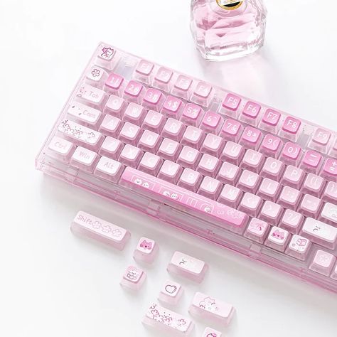 Transform your pink gaming setup into a whimsical wonderland with this Kawaii Aesthetic Gaming Keyboard! 🎮🎀 Immerse yourself in the perfect fusion of cuteness and performance, where every keystroke becomes a magical experience. Let the enchanting designs and pastel hues complement your pink-themed oasis, adding a touch of charm to your gaming haven. ⌨️🌟 Elevate your gameplay while surrounded by the delightful aesthetics that inspire both style and victory. 🌸🏆 Pink Gaming Computer, Pink Gaming Keyboard, Cute Keyboards, Pink Gaming Setup, Kawaii Keyboard, Fancy Keyboard, Aesthetic Gaming, Youtuber Dr, Cheap Room Decor