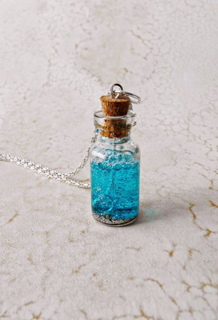 Disney has an all new Tinkerbell movie being released in April. I am one of several bloggers chosen to help promote awareness for The Pirate Fairy, a fun new kids movie from the world of Peter Pan. This Fairy Dust Bubble Necklace is inspired by fairies like Tinkerbell and fun to make … Fairy Bubbles, Bubble Fairy, Neverland Party, Tiny Bottles, Gnome Diy, Pirate Fairy, Pagan Spirituality, Bubble Wand, Tinkerbell Party