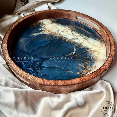 Get your hands on our Wooden resin tray with a stunning marble-effect design evoking the serene beauty of the deep ocean. Shop now! Pan India delivery. • • • #resintray #bhfyp #trendingnow #artistsinindia #resinartistinindia #aesthetichomedecor #ａｅｓｔｈｅｔｉｃ #tabletop #marbleeffect #marbletray #oceantheme #bluedecor #nouveauhaven #nouveauhavenstudio #bangalore #mumbai #kerala #bangaloretimes #bangaloreinfluencers #bangaloreshopping [shopping in Bangalore, best home decor in Bangalore, onlin... Wooden Resin Tray, The Deep Ocean, Resin Tray, Marble Tray, Deep Ocean, Ocean Themes, Marble Effect, Blue Decor, The Deep