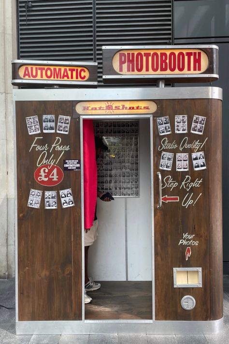 Photo of a vintage photobooth with a man standing inside Vintage Photobooth Aesthetic, Spitalfields Market London, Vintage London Aesthetic, London Cafe Aesthetic, London Boy Aesthetic, Old London Aesthetic, London Aesthetic Vintage, London Summer Aesthetic, Living In London Aesthetic