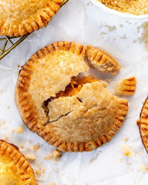 These Sweet Potato Hand Pies are made with a buttery crust, creamy sweet potato filling and lots of love! This recipe is inspired by a childhood favorite treat, her grandmother's Sweet Potato Jacks! Pumpkin Hand Pies, Quince Paste, Wild Recipes, Hand Pie Recipes, Apple Hand Pies, Pie Pops, Honey Pie, Hand Pie, Flaky Pie Crust