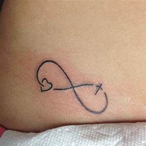 infinity tattoo heart tattoos on Instagram Cross And Heart Tattoo, Heart And Cross Tattoo, Cross Heart Tattoos, Cross Tattoo Meaning, Heart With Infinity Tattoo, Cross Tattoo On Wrist, Cute Foot Tattoos, Heart And Cross, Small Heart Tattoos