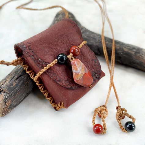 Cartomancy on the go? Here's a tiny little necklace pouch carrying a mini playing card deck so you can entertain with readings wherever you are 🤗 Crystal detailing: Red Jasper & Black Agate ~Mia www.spiritcarrier.com #wisdomkeeper #divination #cartomancy #playingcards #minicards #cardreading #oracle #hedgewitch #leathercraft #oracle #shamanic #necklace Necklace Pouch, Little Necklace, Hedge Witch, Playing Card Deck, Card Deck, Black Agate, Playing Card, Red Jasper, Card Reading