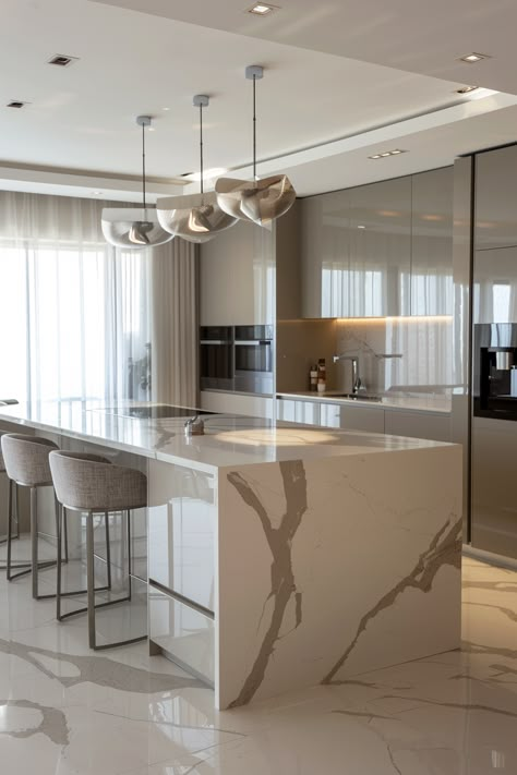 Transform Your Home with This Luxe, Minimalist Kitchen Design! White Marble Island, Kitchen Island Marble, Light Kitchen Colors, Island Marble, Modern Kitchen Island Design, Kitchen With Marble, White Countertop, Elegant Kitchen Design, Unique Pendant Lights