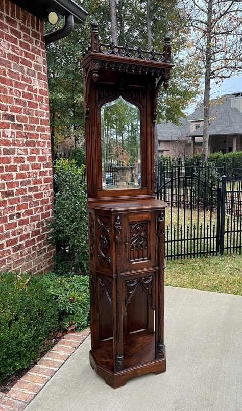 Antique French Gothic Revival CARVED Walnut Mirrored Credence Cupboard or Cabinet~~VERSATILE SIZE~~c. 1880s     CHARMING antique cabinet in popular French Gothic Revival style~~upper canopy with pierced gallery and drop finials, lower single cabinet door with shelved interior, carved tracery accents, arches, and figural saint resting on canted corner posts~ key is included~~can be moved in 2 pieces      VERSATILE size~~only 14.5" deep~~fits in small spaces~~perfect for an entry or hallway, praye Vintage Gothic Furniture, Victorian Gothic Furniture, Gothic Library Room, Gothic Apartment Decor, Gothic Shelf, Dream House Aesthetic, French Gothic, Gothic Interior, Cupboard Cabinet