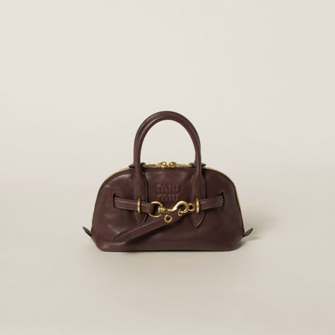 Briarwood Aventure Nappa Leather Top-handle Bag | Miu Miu Miumiu Bags, Miu Miu Wallet, Miu Miu Bag, Leather Duffle Bag, Saddle Brown, Leather Duffle, Louis Vuitton Shoulder Bag, Iconic Bags, Leather Pumps