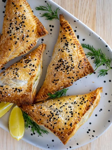 Spinach and Feta Triangles Recipe | Simple Home Edit Mushroom Turnovers, Sesame Seeds Recipes, Cheese Breakfast, Jewish Food, Home Edit, Family Friendly Dinners, Puff Pastry Sheets, Caramelized Onion, Spinach And Cheese