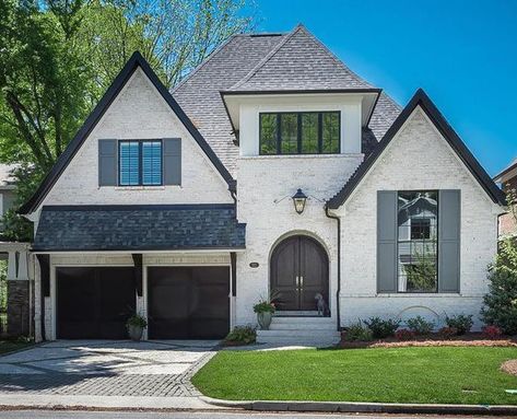 Chesapeake Pearl Queen brick with White Mortar on this charming cottage style home with a gray roof and gray shutters. White Brick House Gray Roof, White Grey Brick House, Chesapeake Pearl Brick Exterior, Chesapeake Pearl Brick With White Mortar, Chesapeake Pearl Brick, White Brick Homes, Gray Shutters, Brick Options, Pine Hall Brick