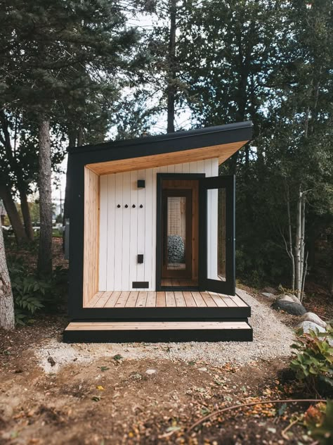 Meet Cedar & Stone's Model 5 outdoor sauna, featured in white. This sauna is sustainably built in Duluth, MN, the sauna capital of North America. Saunas ship nationwide. Build yours: https://cedarandstonesauna.com/build/ Outdoor Home Sauna, Rustic Saunas Backyard, Patio Sauna, Wood Sauna Outdoor, Backyard Sauna Landscaping, How To Build A Sauna, Outdoor Cedar Shower Ideas, Sauna Landscaping, Small Outdoor Sauna Diy