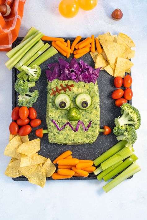 This simple Frankenstein guacamole makes the perfect Halloween appetizer! Frankenstein Guacamole, Unripe Avocado, Pizza Twists, Halloween Appetizer, Veggie Plate, Halloween Themed Food, Chunky Guacamole, Halloween Class Party, How To Make Guacamole