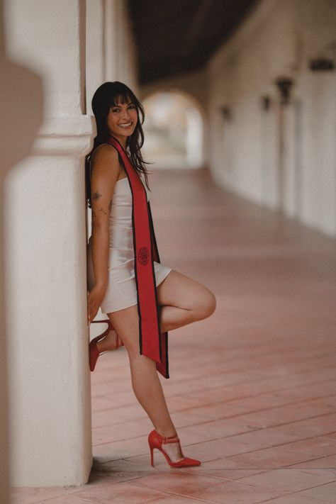 #graduation #2023 #sdsu #gradpics Cute Grad Photo Ideas, Creative Photoshoot Ideas Graduation, Graduation Pictures For High School, Graduation Photos Inspiration, Red Dress Graduation Pics, Classy College Graduation Pictures, Graduation Pictures Sitting Down, College Grad Poses Picture Ideas, University Grad Photoshoot