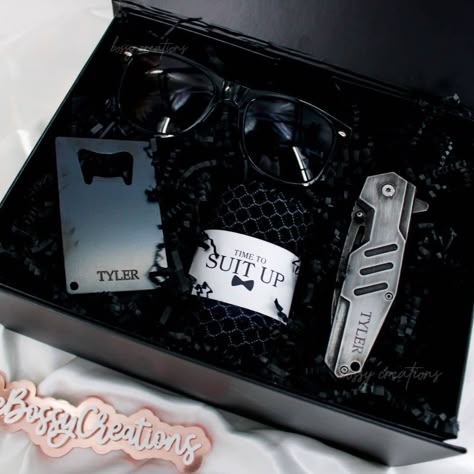 Make your groomsmen or best man feel special on your big day! With Our Black Groomsman Proposal Box, you can give them a memorable and timeless gift that will last forever.Our sleek black box includes custom engraved items like a pocket knife, bottle opener and fashionable accessories like socks and sunglasses – all elegantly packaged with a modern aesthetic. Show your appreciation to those closest to you with Bossy Creation's Groomsman Proposal Box! Box includes:🌟 1 Engraved pocket knife with Best Man Proposal Ideas Brother, Groomsmen Proposal Country, Cricut Groomsmen Gifts, Grooms Proposal Boxes, Groomsmen Gifts Non Alcoholic, Bestman Boxes, Will You Be My Groomsmen, Best Man Box Ideas, Groomsman Proposal Gifts