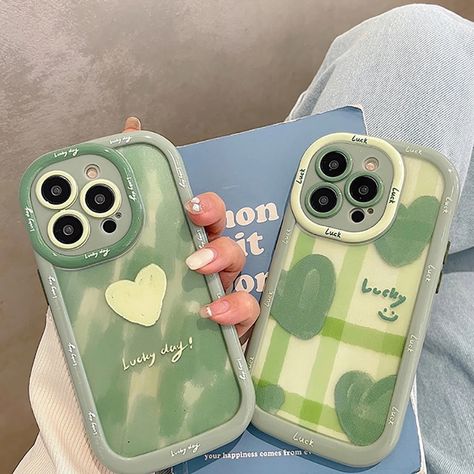 Protect your phone in style with the Cute Green Heart Love Lucky Letters Shockproof Bumper Phone Case. This case features a fun design with a shock-absorbing bumper for added protection. It's made from high-quality materials and has precise cutouts for easy access to all your phone's features. Express your personality while keeping your phone safe with this unique and playful case. Iphone Cases Green, Case Hp Design, Sparkly Phone Cases, Diy Phone Case Design, Green Phone Case, Retro Phone Case, Stylish Iphone Cases, Girly Phone Cases, Iphone Cases Cute