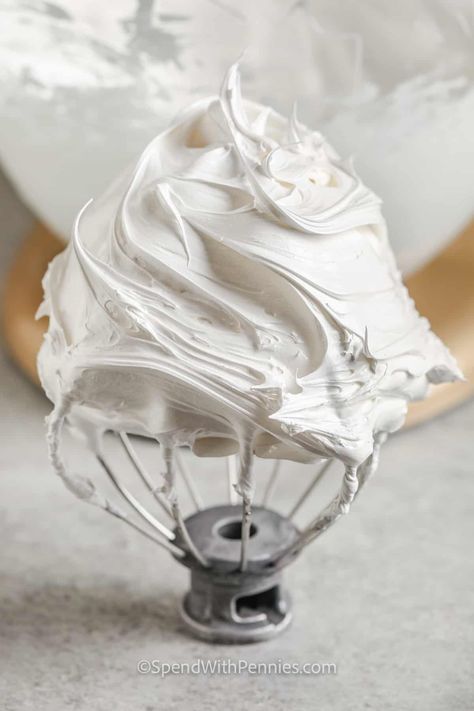 Make homemade marshmallow fluff for a tasty treat that has so many uses! It's the best on a peanut butter sandwich, or it can be used to make the best hot fudge sundae ever. Try it as a fruit dip, or add it to cheesecake filling. So many options for this sweet dessert sauce! #marshmallowfluff #homemaderecipes #easymarshmallowfluffrecipe #spendwithpennies Marshmallow Fluff Recipes Desserts, Chewy Rice Krispie Treats, Maple Marshmallows, Marshmallow Sauce, Marshmallow Fluff Recipes, Homemade Marshmallow Fluff, Fudge Sundae, Christmas Baking Cookies, Homemade Marshmallow